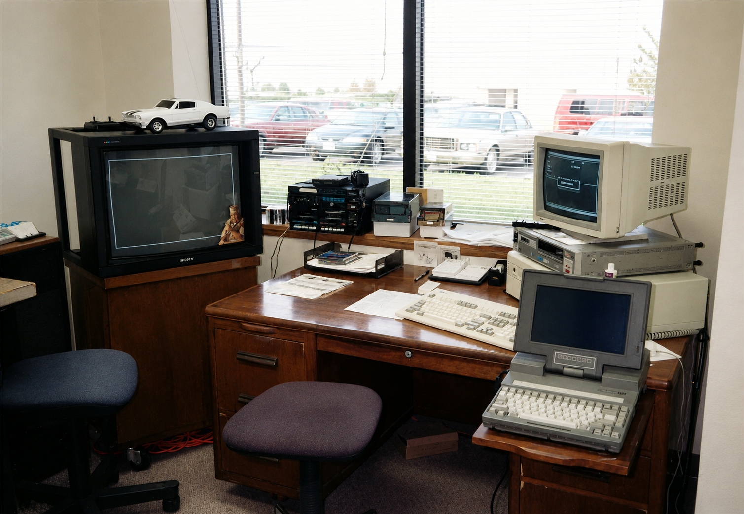 Early Lanex office with vintage computer systems and technology showcasing the company's beginnings.